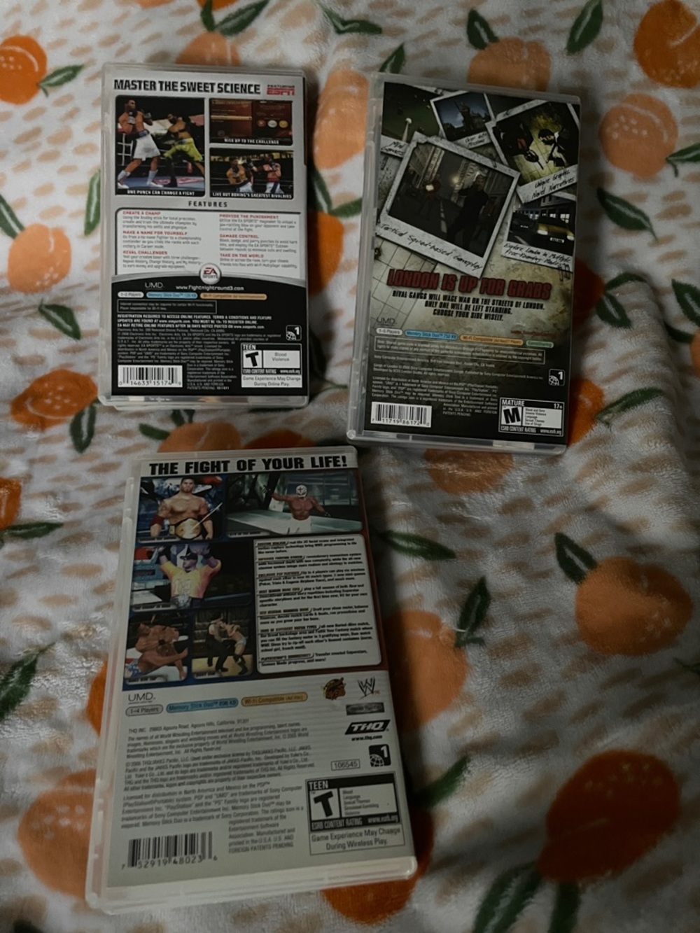 Sony PSP Game Lot - Black, White, Orange Covers - Picture 2 of 3